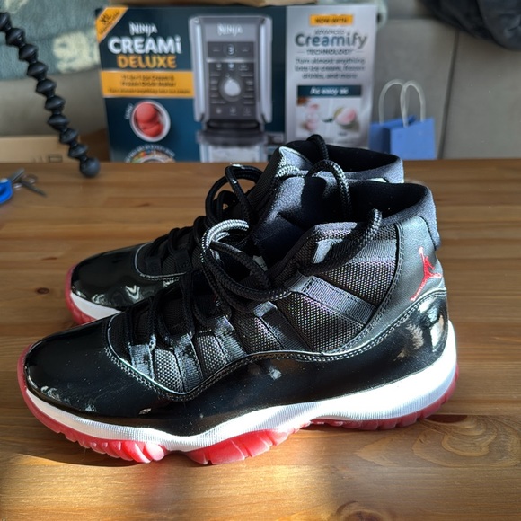 Men’s Air Jordan Bred 11s - Picture 5 of 11